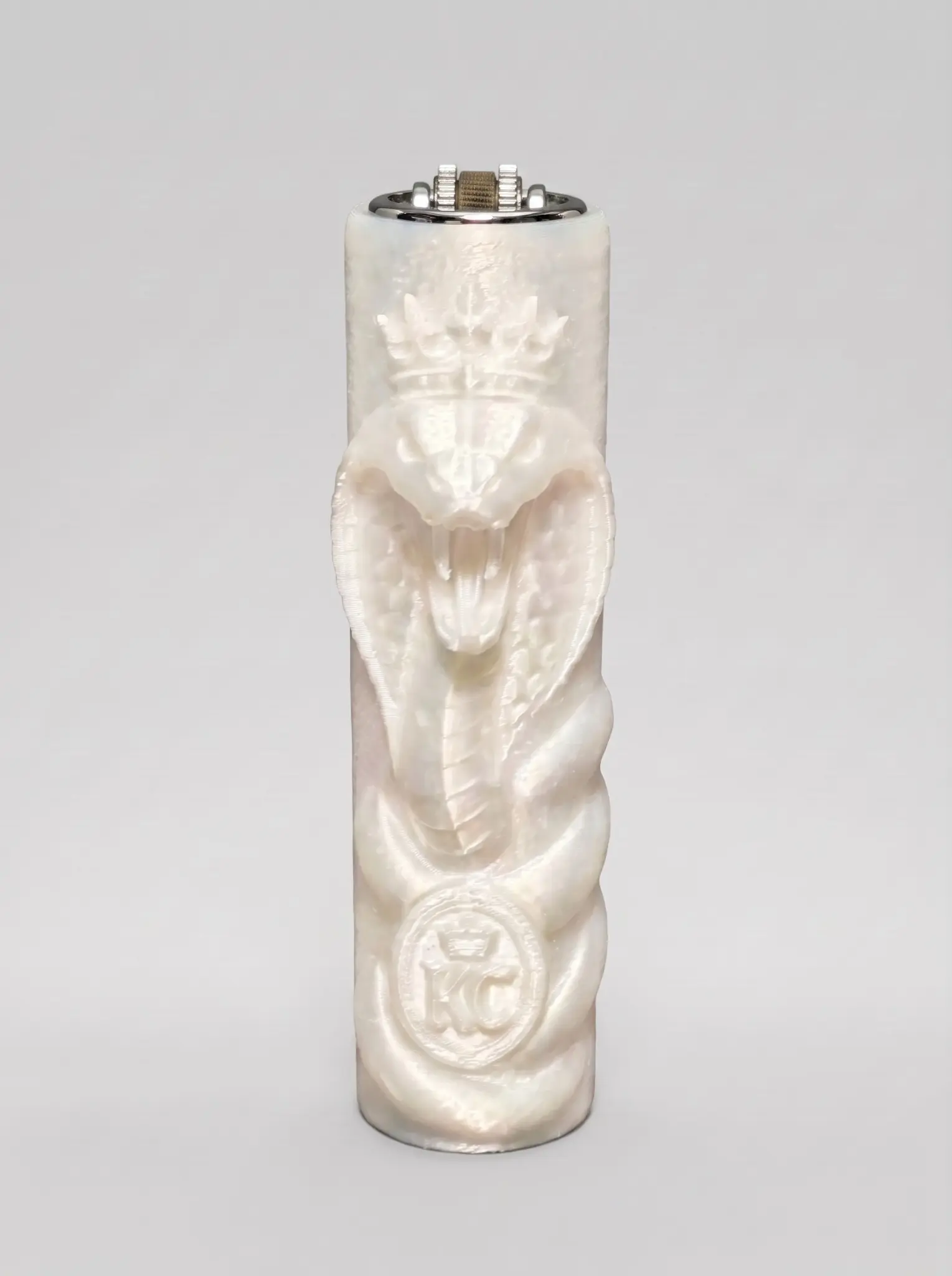 Pearl-white King Cobra lighter sleeve with a sculpted cobra head and coiled-body relief