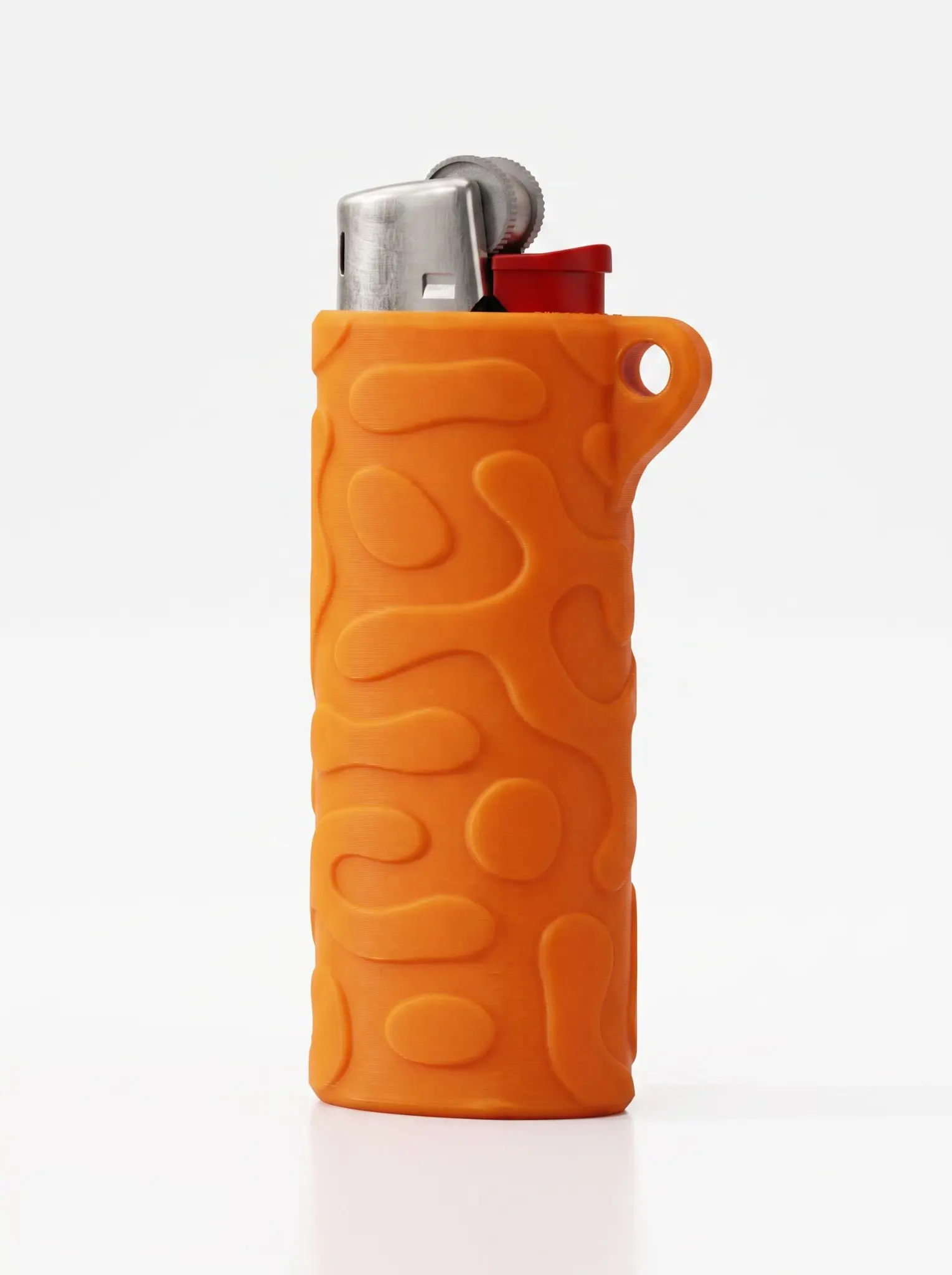 Bright-orange WaveGrip lighter sleeve with raised organic grip shapes and an integrated keychain loop